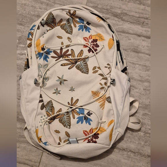 The North Face Women's Backpack with Floral Design - White, Blue, and Yellow - Picture 1 of 7